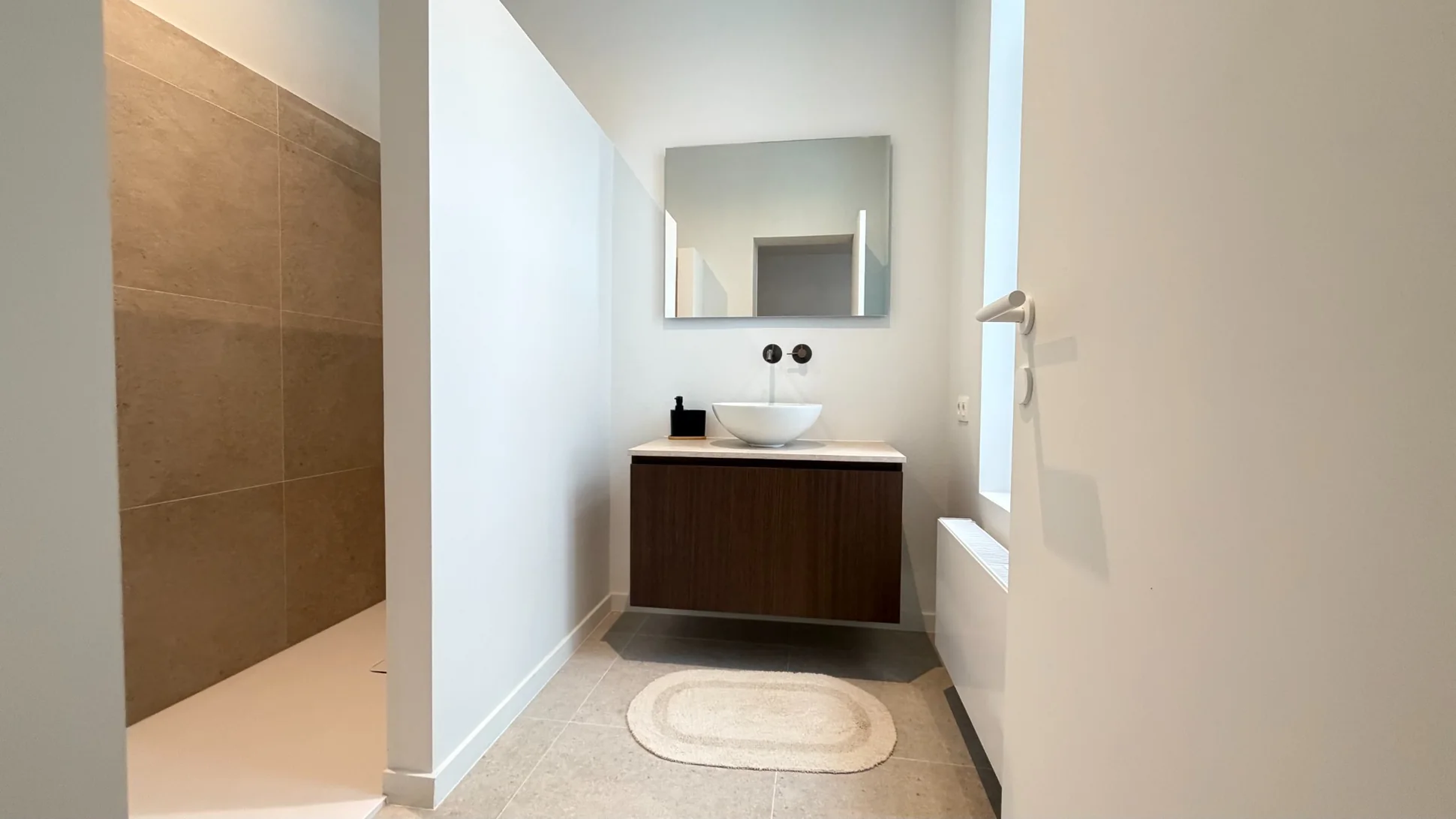 Bathroom with modern minimalist washbasin