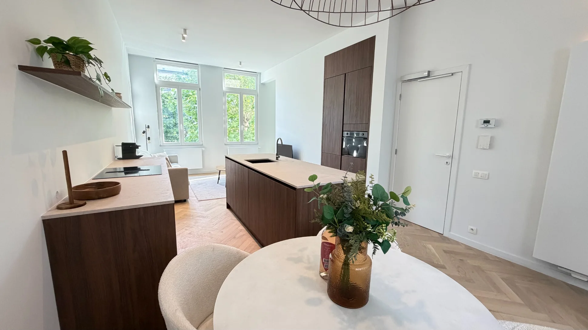 Warm wood kitchen and thoughtfully styled dining table